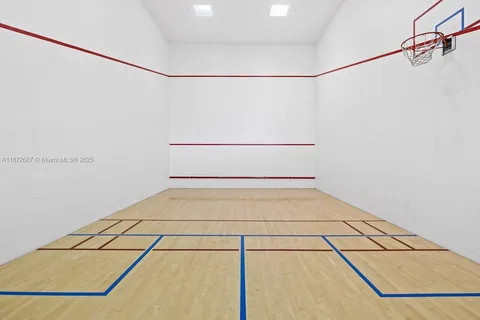 a view of a bench in wooden floor