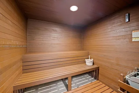 a view of a swimming pool with outdoor seating