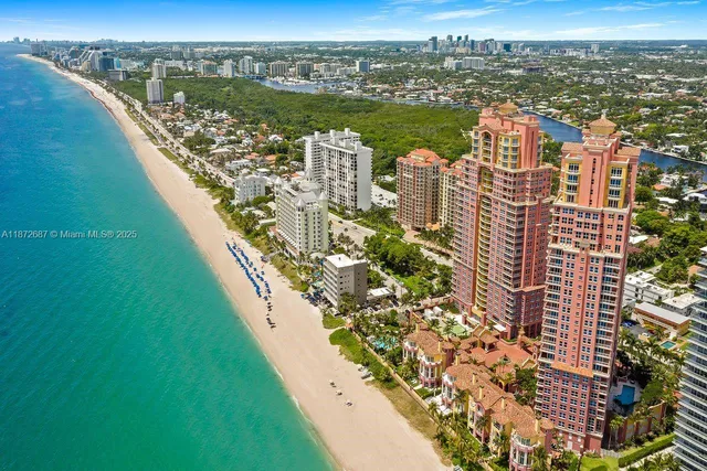 a view of city with ocean