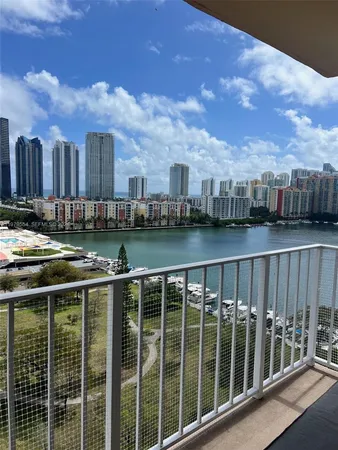 a view of a balcony with city