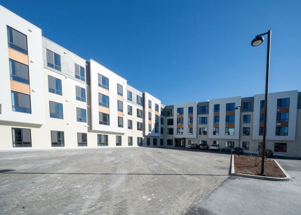 a view of building with balcony