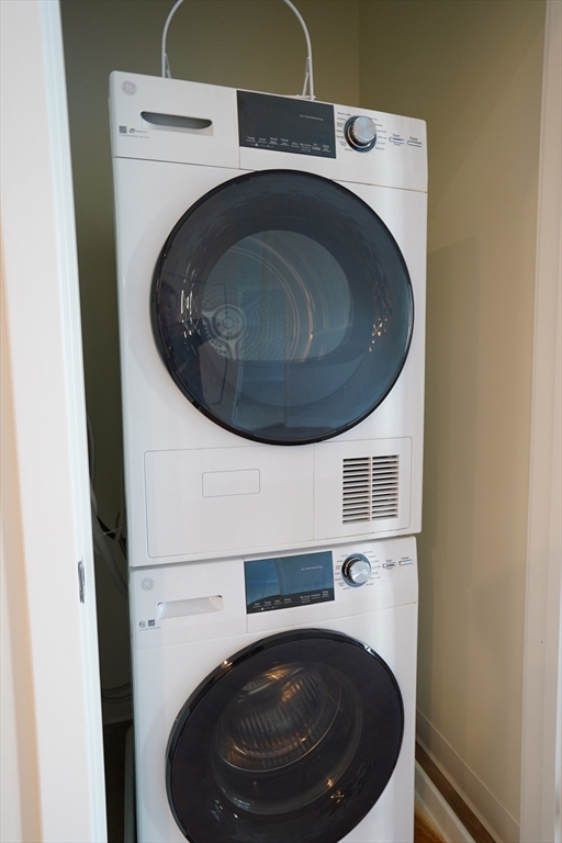 289 Walk Hill Street, Unit 327 Boston, MA 02131 - Photo 27 of 31 a close up view of a washer and dryer