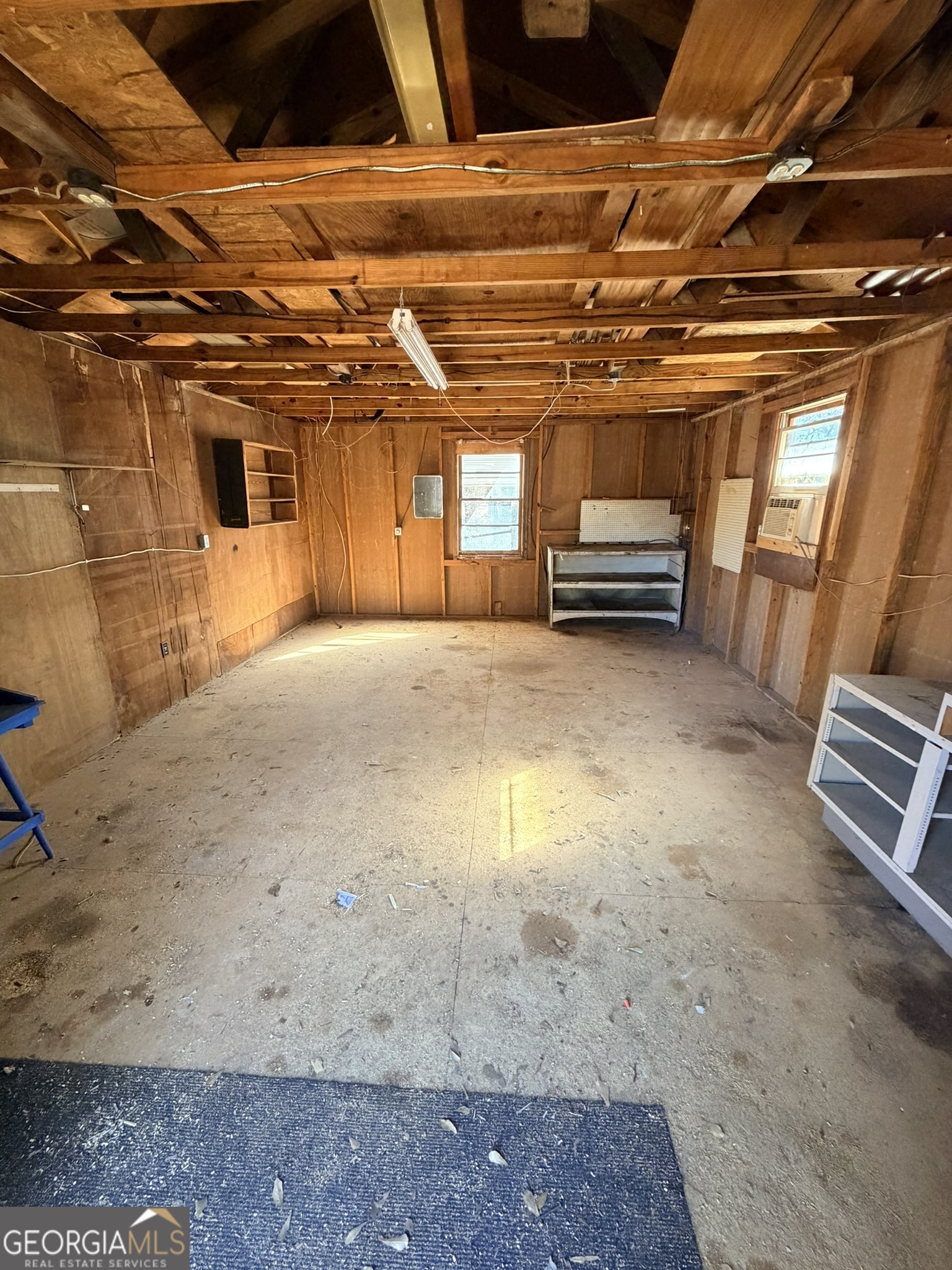 102 Lee Street Centerville, GA 31028 - Photo 21 of 30 a view of a room with wooden walls