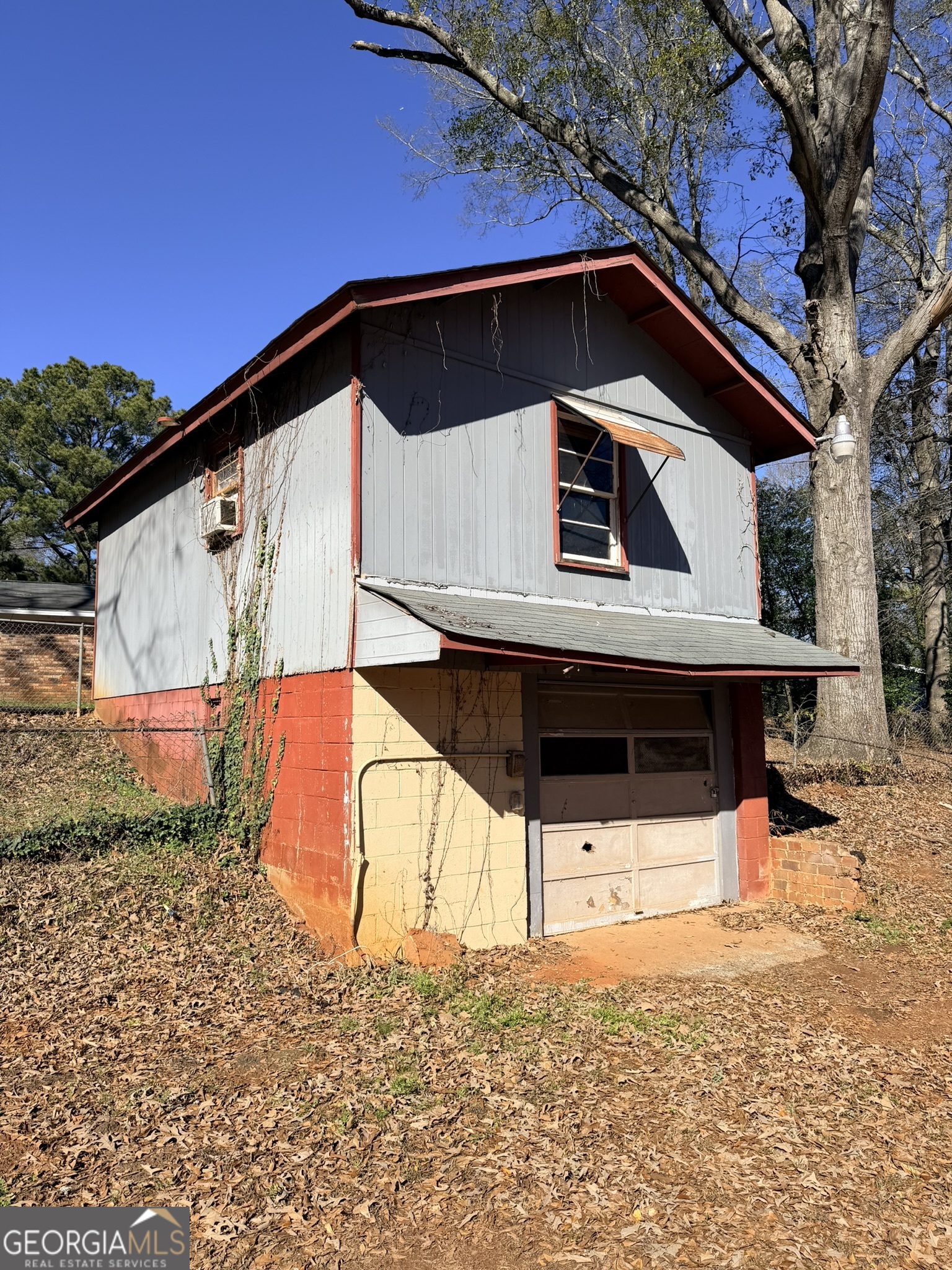 102 Lee Street Centerville, GA 31028 - Photo 23 of 30 a view of house with sign board and yard