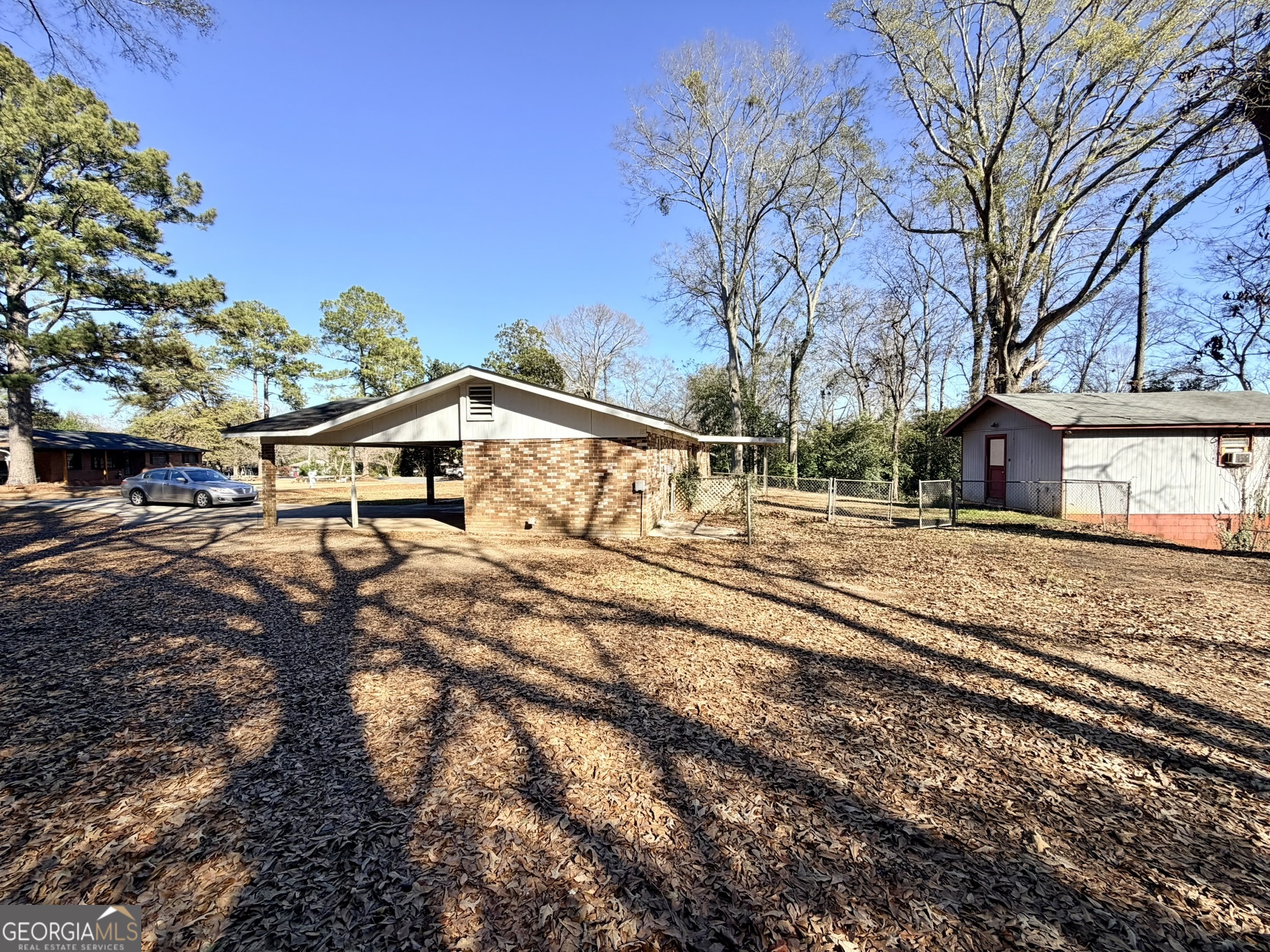102 Lee Street Centerville, GA 31028 - Photo 27 of 30 a view of house with backyard and trees
