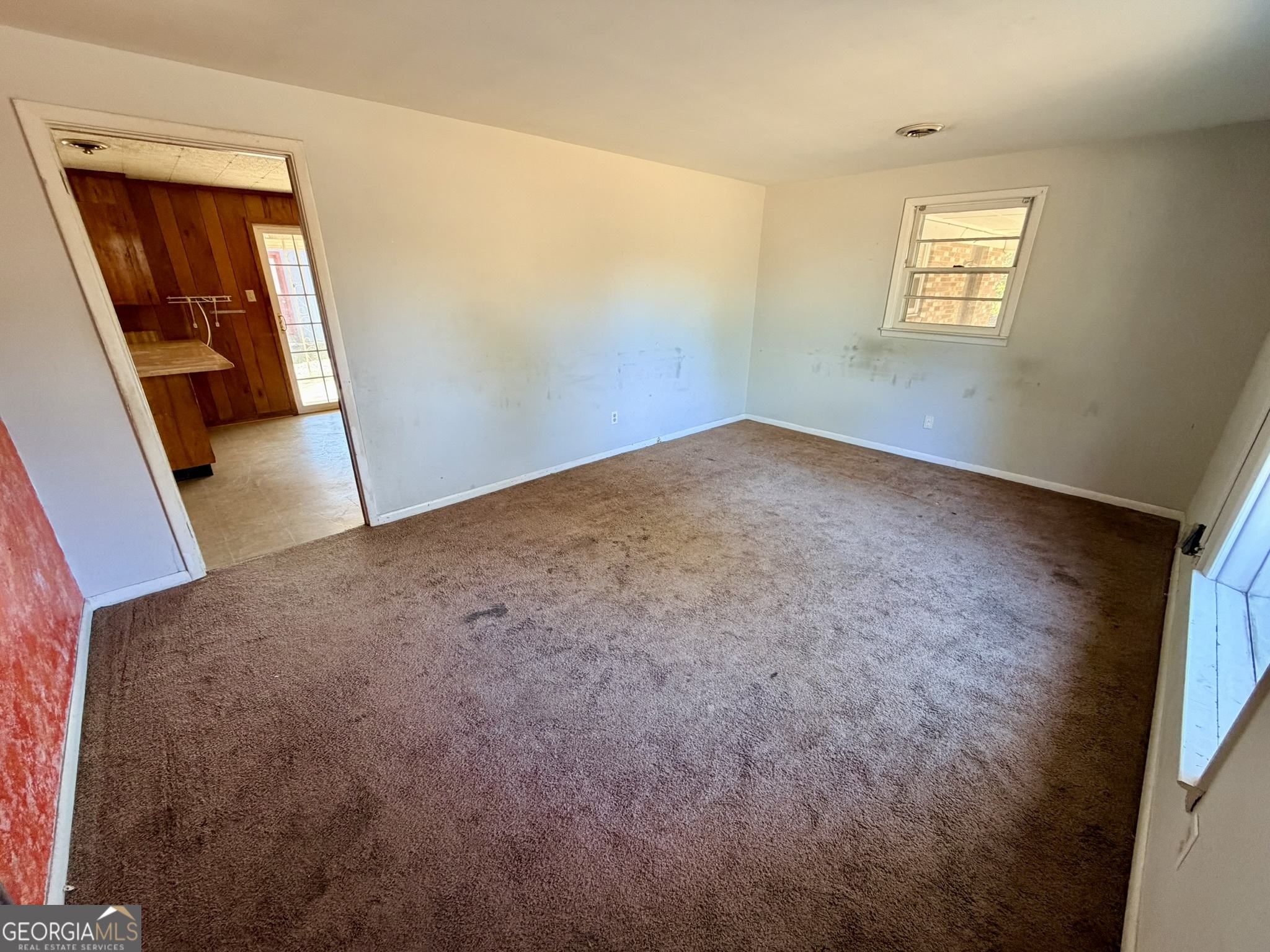 102 Lee Street Centerville, GA 31028 - Photo 4 of 30 an empty room with windows