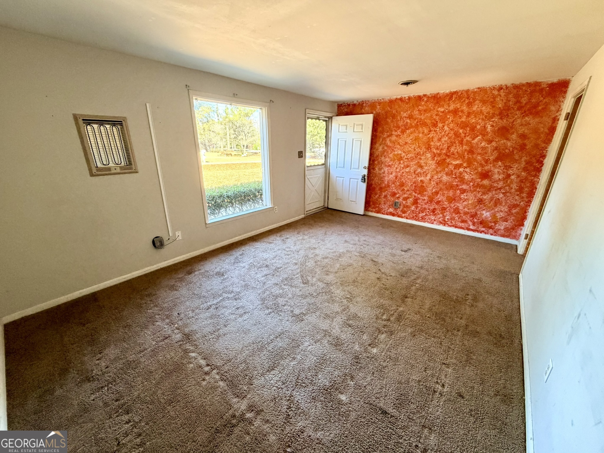 102 Lee Street Centerville, GA 31028 - Photo 5 of 30 a view of an empty room with a window