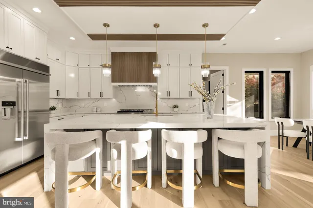 a view of a dining room with furniture and window