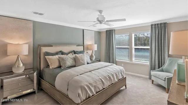 a bedroom with bed and window