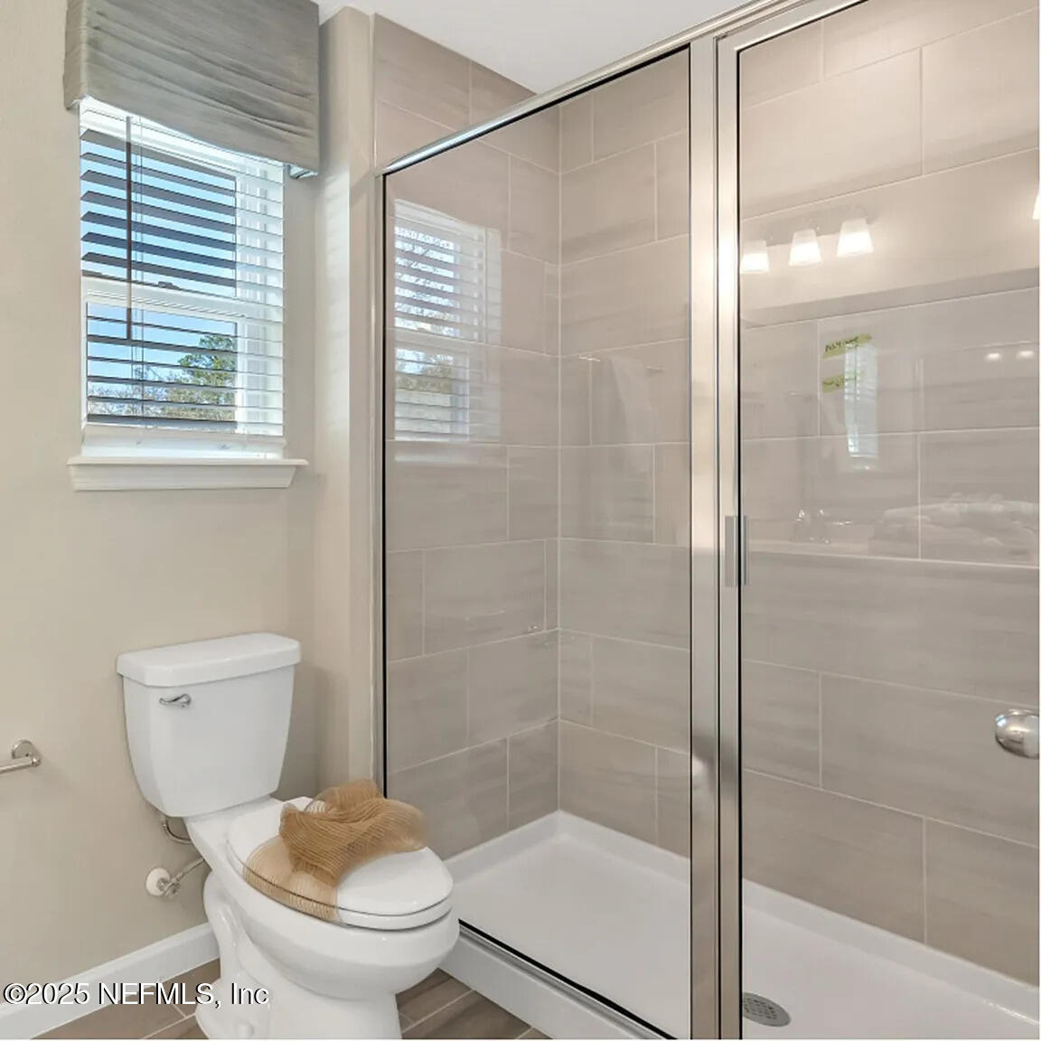 20 Carmella Court St. Augustine, FL 32092 - Photo 16 of 20 a bathroom with a toilet and a shower