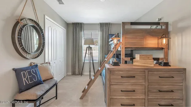 a hallway with a large window and mirror