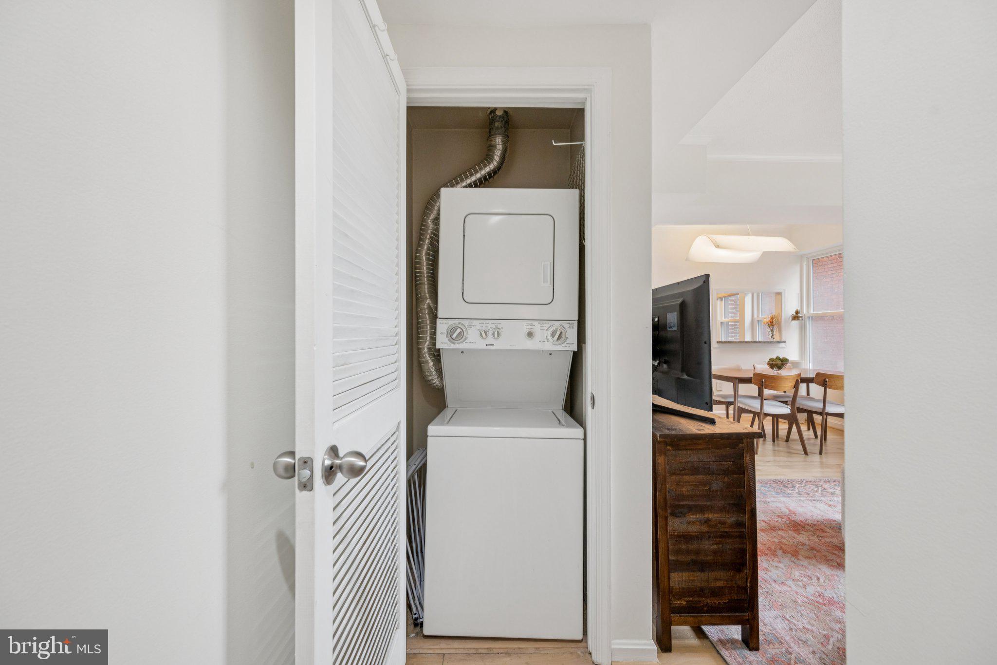 1812 Vernon Street Northwest, Unit 34 Washington, DC 20009 - Photo 13 of 26 a utility room with dryer and washer