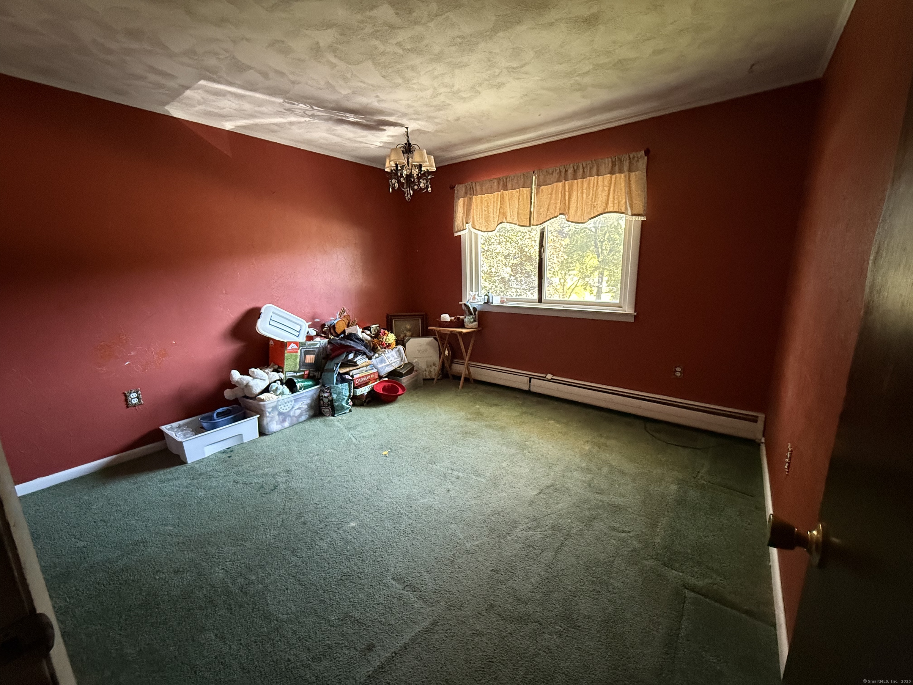 9 Deerbrook Road Norwich, CT 06360 - Photo 7 of 10 a room with toys and a window