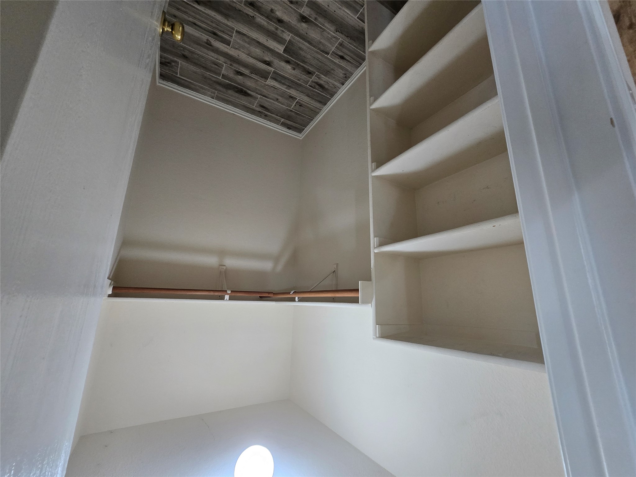 2011 Garrison Drive Leander, TX 78641 - Photo 9 of 23 Walk in closet featuring wood tiled floors