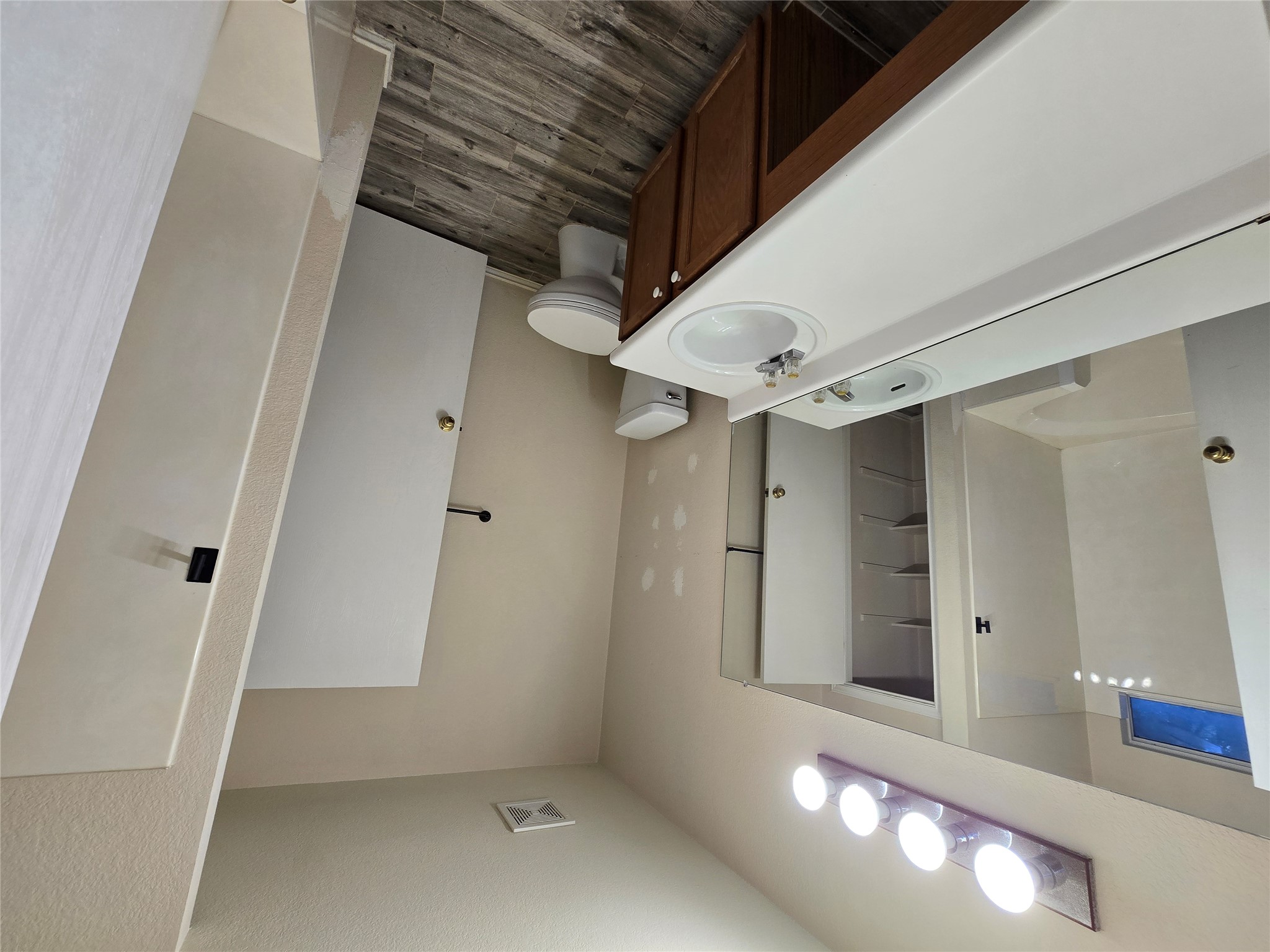 2011 Garrison Drive Leander, TX 78641 - Photo 10 of 23 Bathroom with shower / bath combination, dark wood-style flooring, and vanity