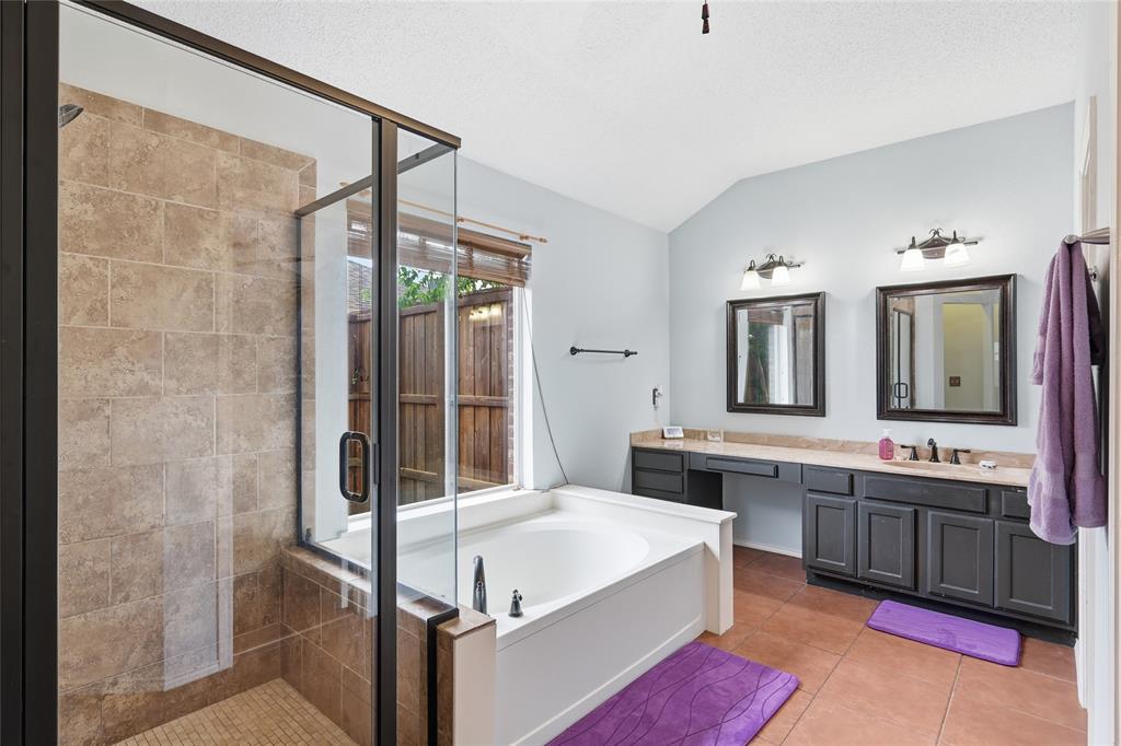 763 Winding Oak Bend Lake Dallas, TX 75065 - Photo 20 of 25 a large white bed sitting in a room next to a window