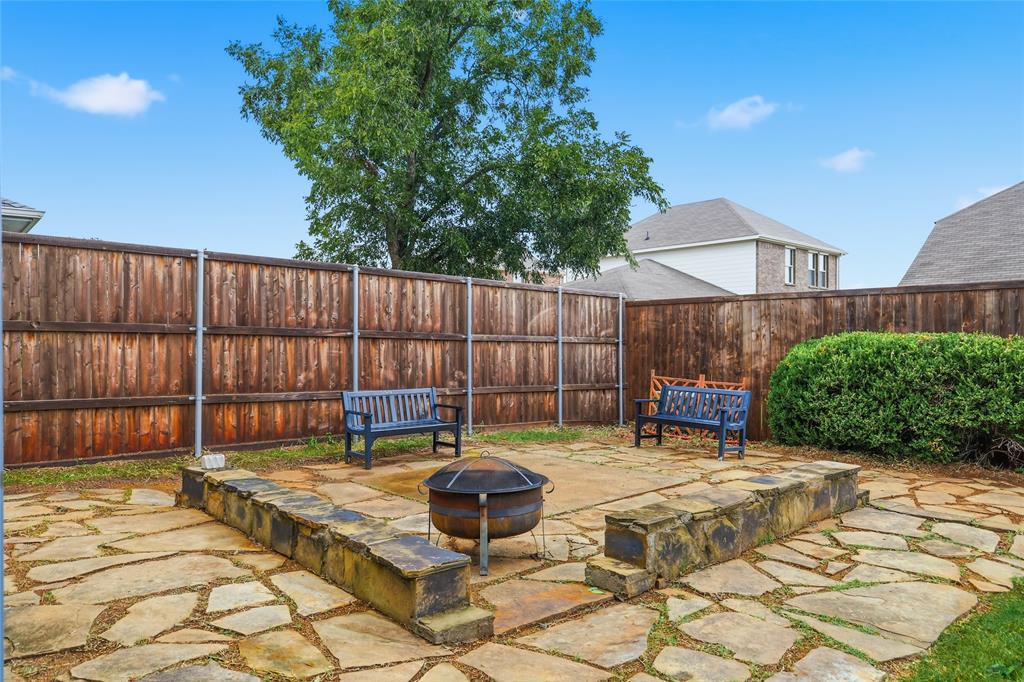 763 Winding Oak Bend Lake Dallas, TX 75065 - Photo 24 of 25 a garden view with a seating space