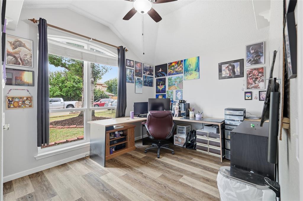 763 Winding Oak Bend Lake Dallas, TX 75065 - Photo 6 of 25 a view of a workspace with furniture and a window