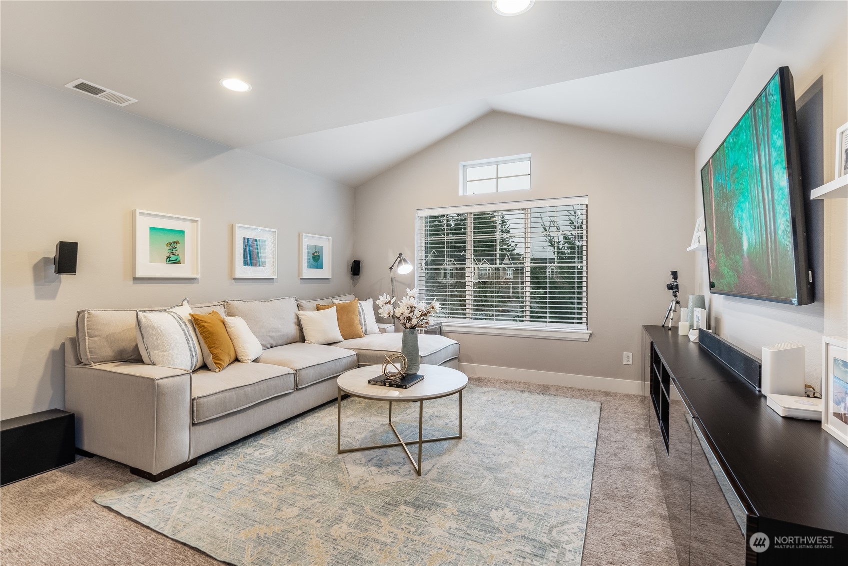 4105 Strumme Road Bothell, WA 98012 - Photo 16 of 40 a living room with furniture flat screen tv and a large window