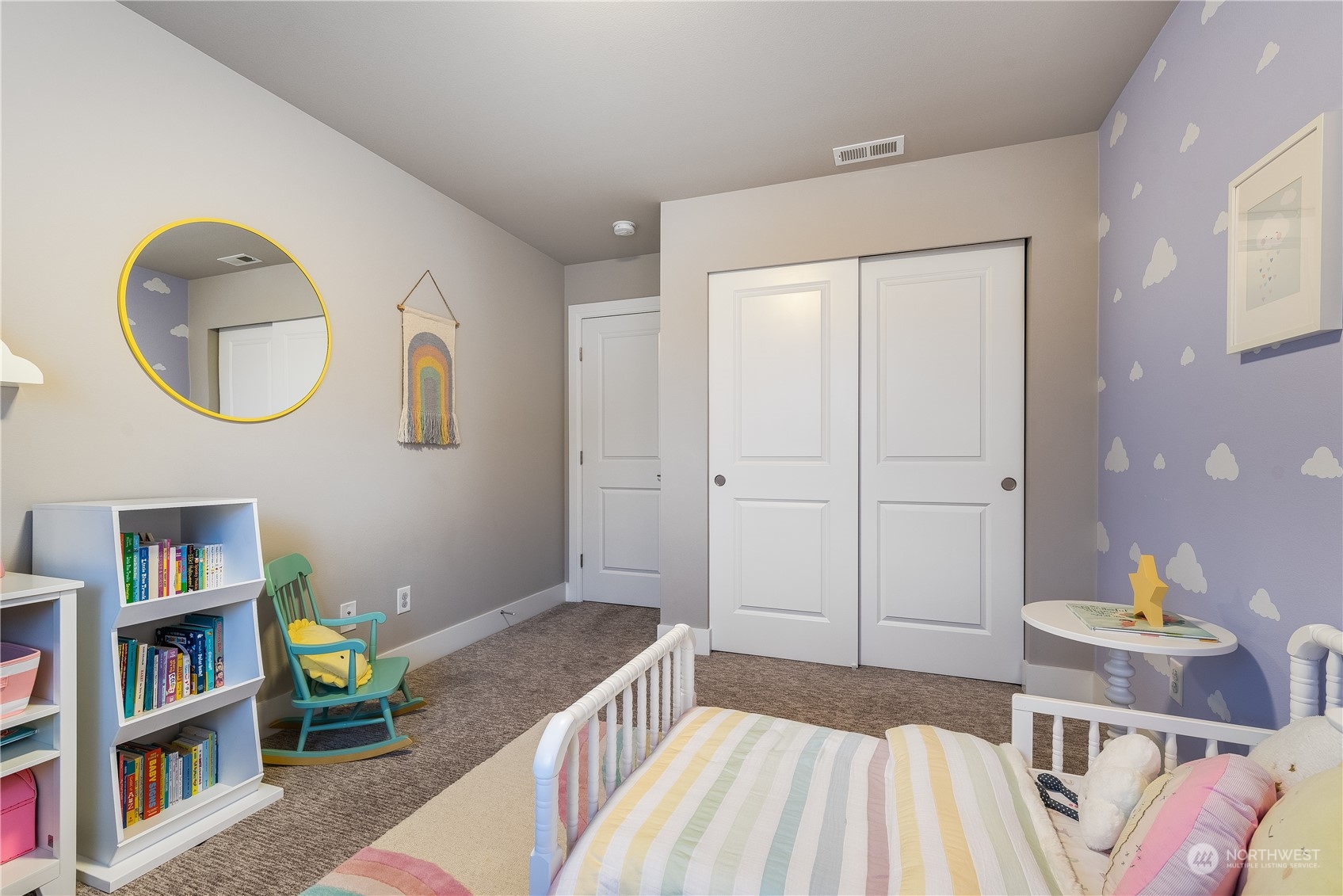 4105 Strumme Road Bothell, WA 98012 - Photo 20 of 40 a bedroom with a bed and a book shelf