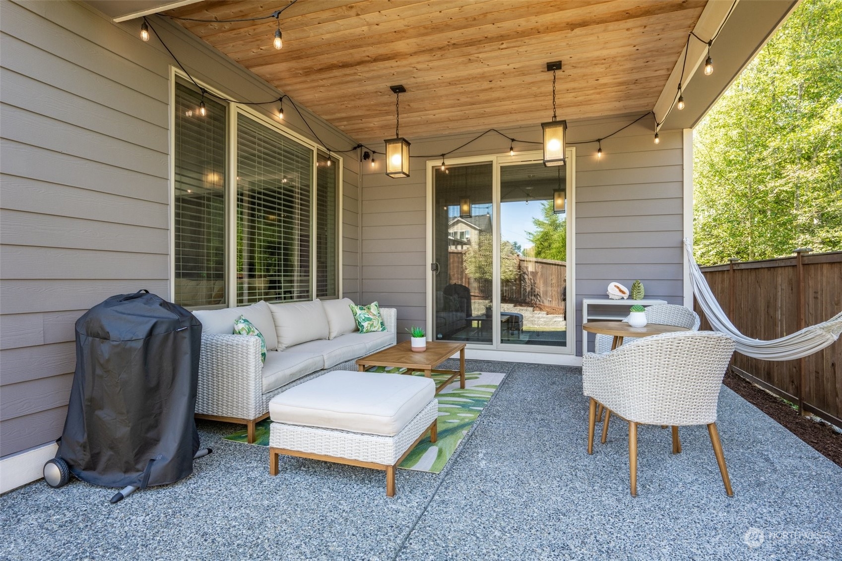 4105 Strumme Road Bothell, WA 98012 - Photo 36 of 40 a outdoor living space with furniture and a potted plant