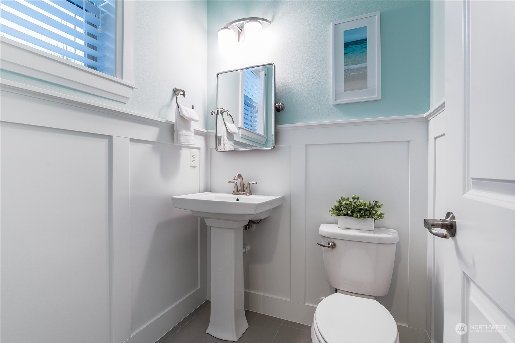 4105 Strumme Road Bothell, WA 98012 - Photo 4 of 40 a bathroom with a sink toilet and a mirror