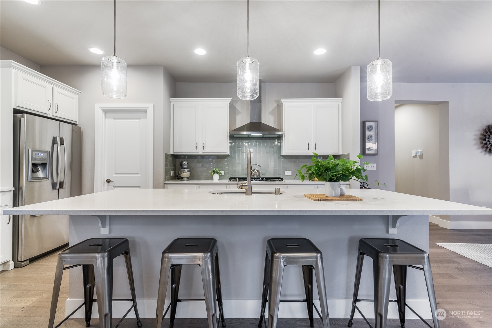 4105 Strumme Road Bothell, WA 98012 - Photo 10 of 40 a kitchen with cabinets and chairs