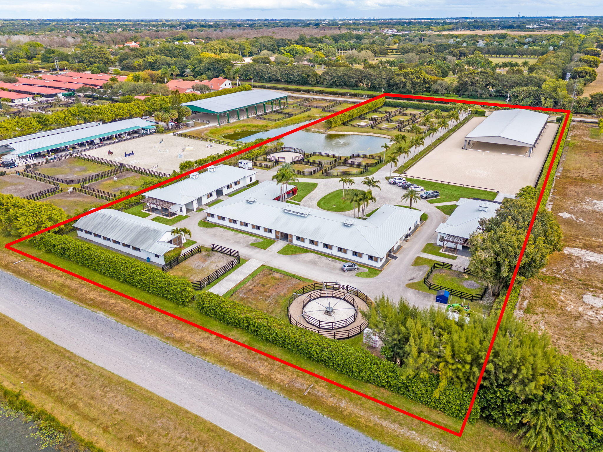 13155 Southfields Road Wellington, FL 33414 - Photo 3 of 70 95-web-or-mls-DJI_20260204131108_0433_D-