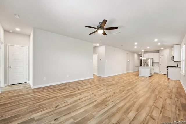 a view of a livingroom with a ceiling fan