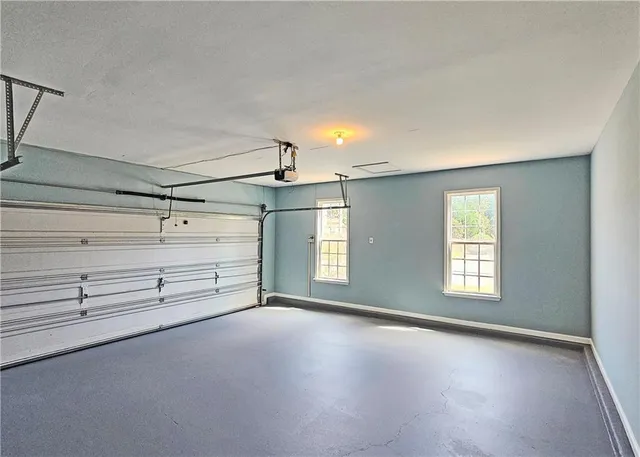 a view of a room with air conditioner and window