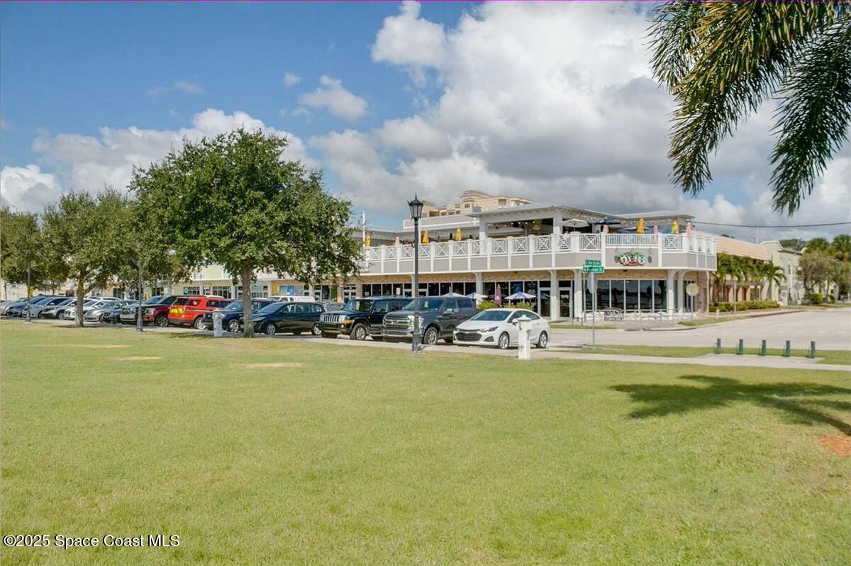 213 Sweet Street Rockledge, FL 32955 - Photo 18 of 24 a swimming pool view with a outdoor seating space