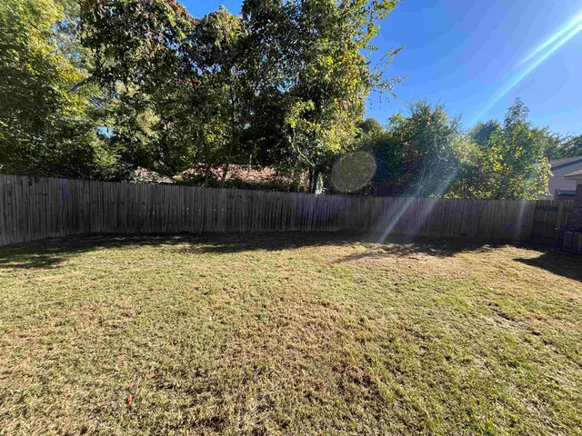 a view of wooden fence