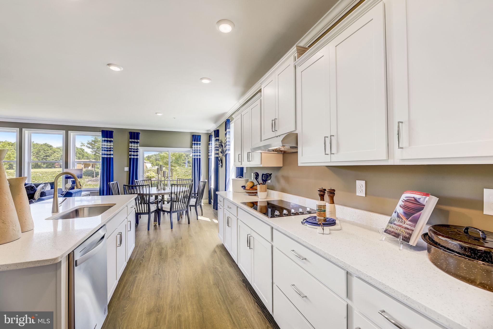 64 Buttercup Circle Elkton, MD 21921 - Photo 11 of 48 a kitchen with sink stove and cabinets