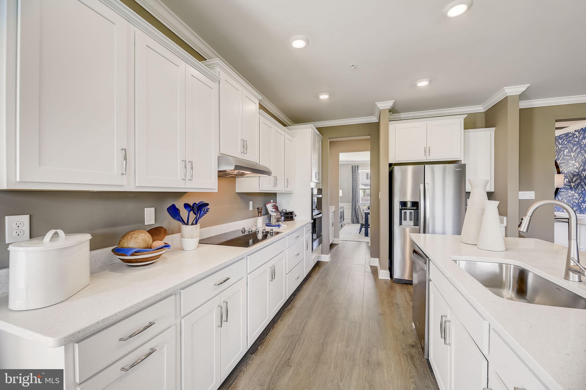 64 Buttercup Circle Elkton, MD 21921 - Photo 12 of 48 a kitchen with stainless steel appliances sink refrigerator and cabinets