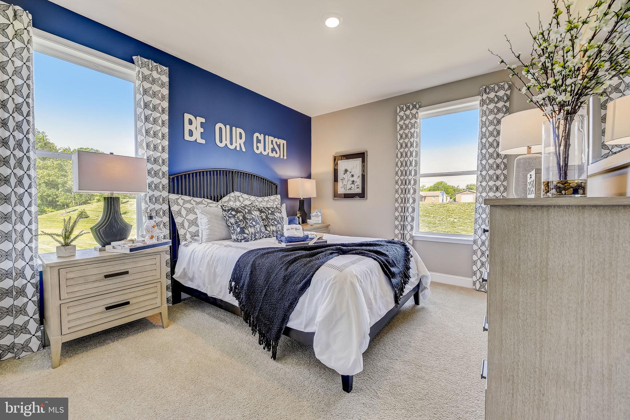 64 Buttercup Circle Elkton, MD 21921 - Photo 19 of 48 a bedroom with a bed and a night stand