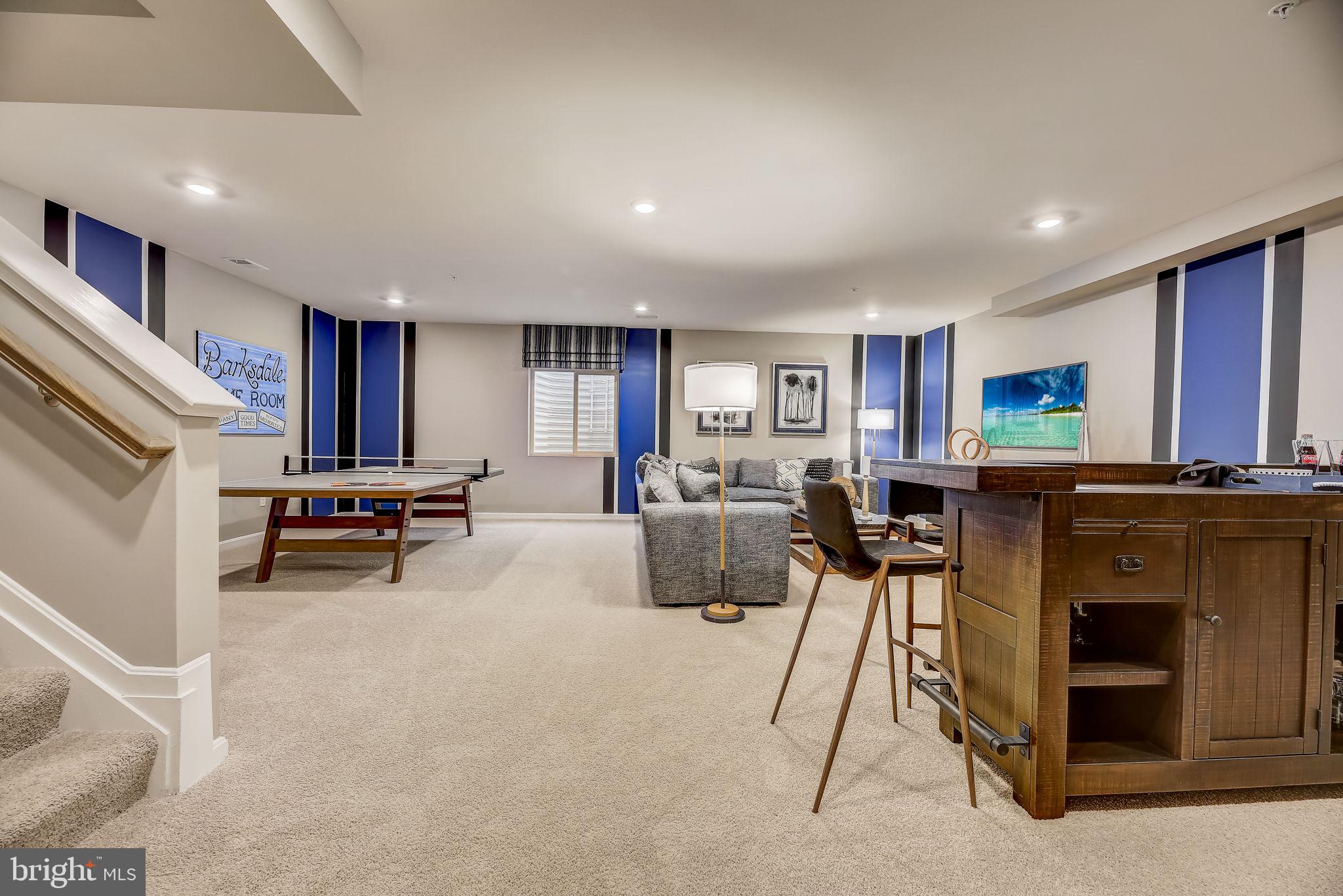 64 Buttercup Circle Elkton, MD 21921 - Photo 22 of 48 a living room with furniture and a flat screen tv