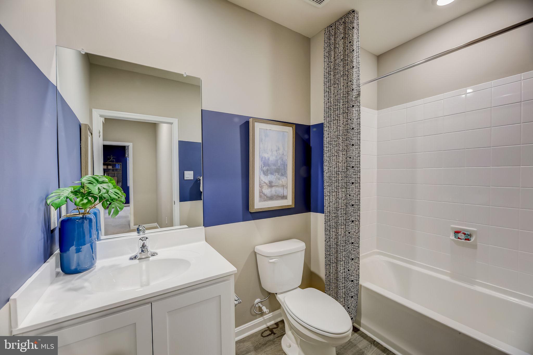 64 Buttercup Circle Elkton, MD 21921 - Photo 30 of 48 a bathroom with a sink toilet and shower