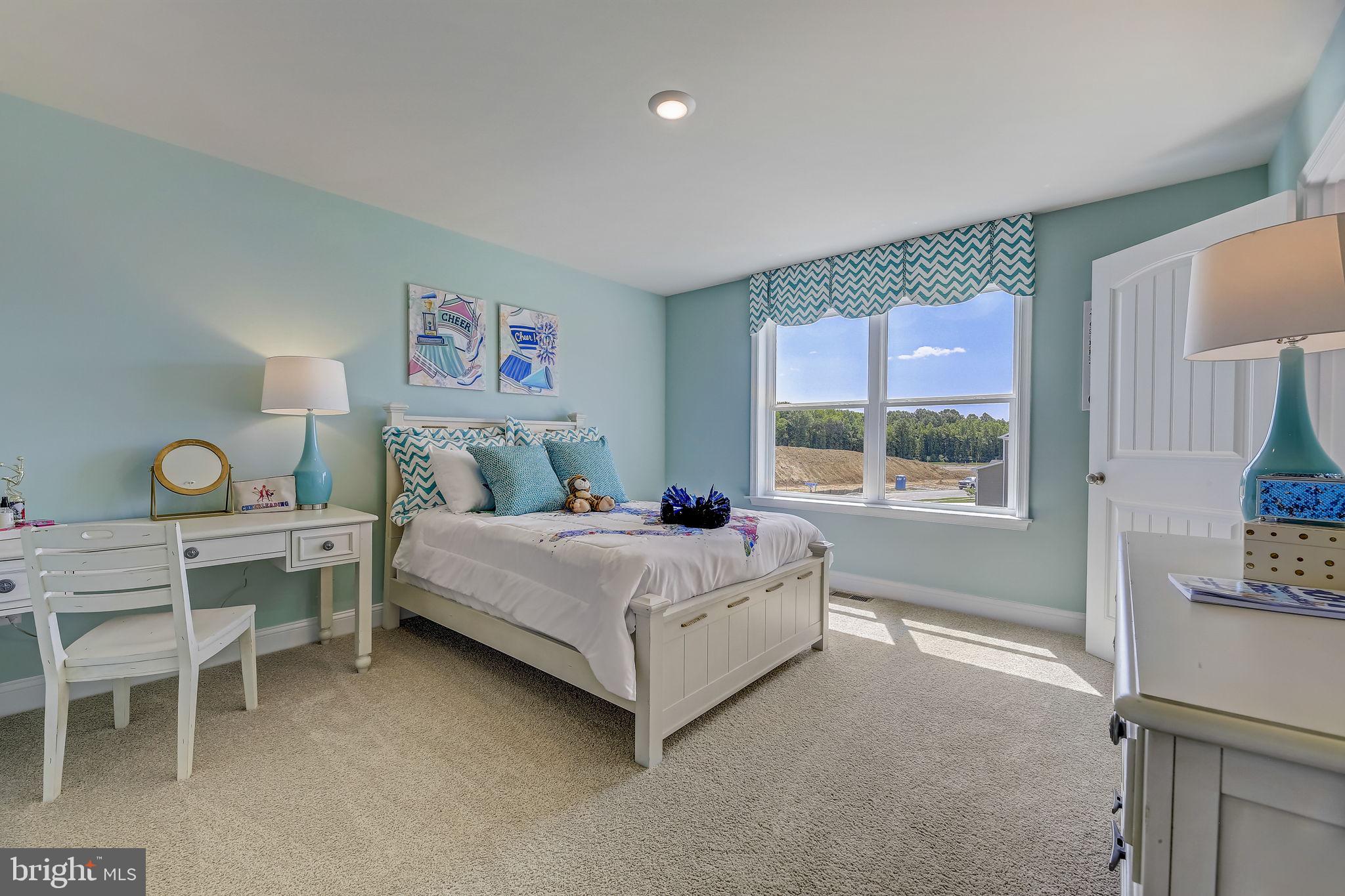 64 Buttercup Circle Elkton, MD 21921 - Photo 35 of 48 a bedroom with a bed and a window