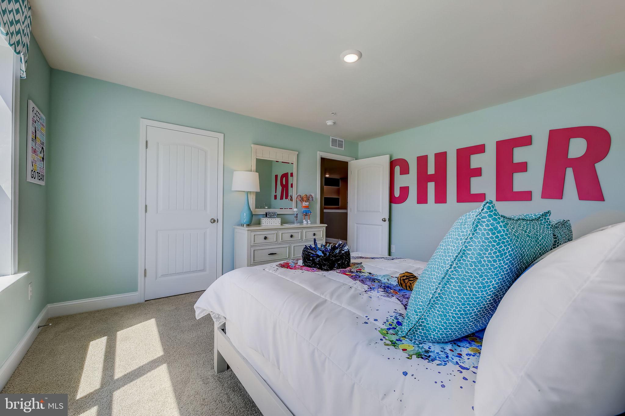 64 Buttercup Circle Elkton, MD 21921 - Photo 37 of 48 a bedroom with a bed and a couch