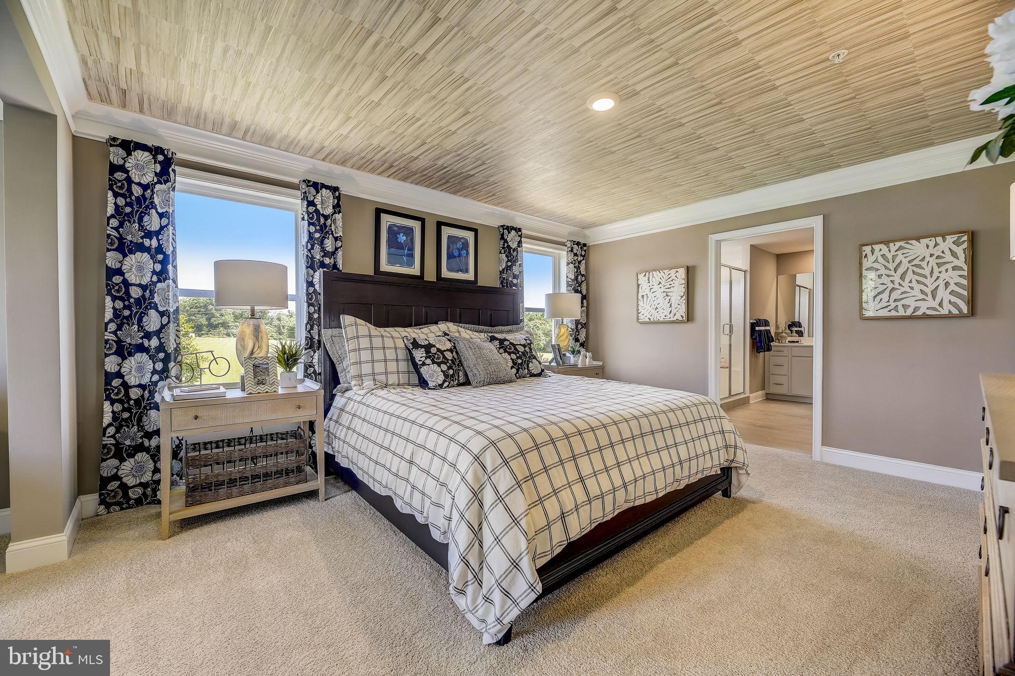 64 Buttercup Circle Elkton, MD 21921 - Photo 42 of 48 a bedroom with a large bed and a window