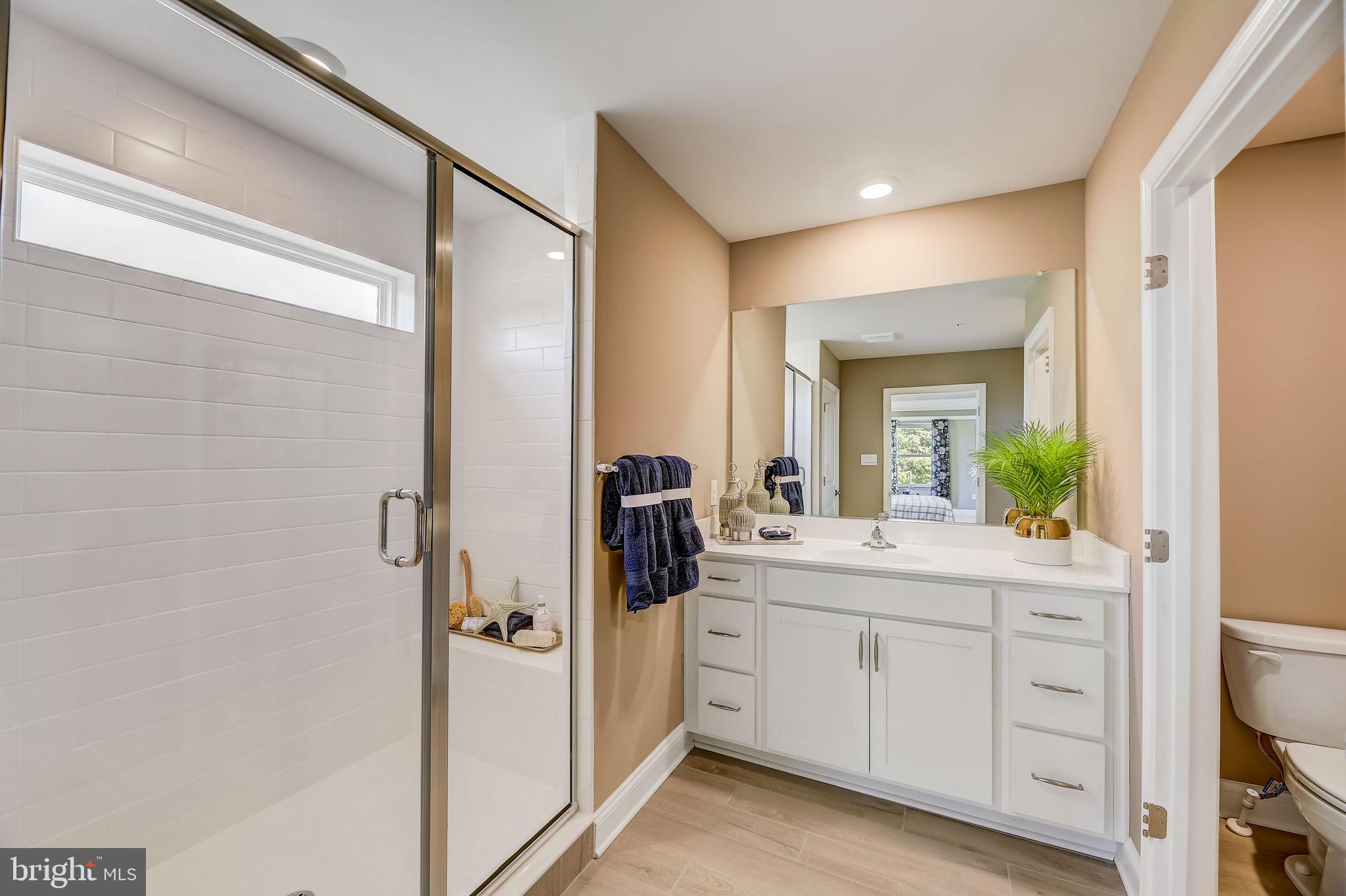 64 Buttercup Circle Elkton, MD 21921 - Photo 46 of 48 a bathroom with a double vanity sink and mirror