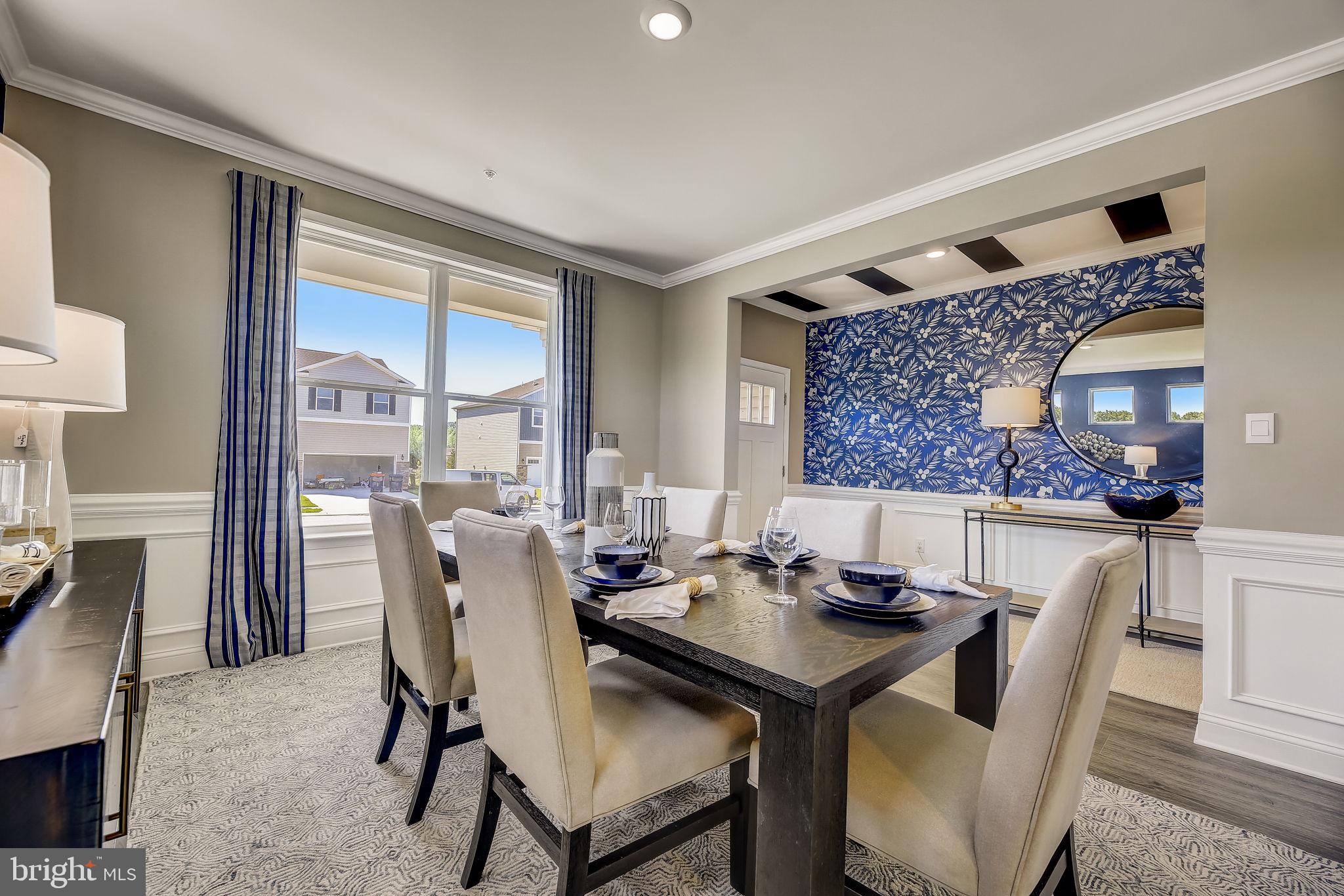 64 Buttercup Circle Elkton, MD 21921 - Photo 5 of 48 a view of a dining room with furniture window and wooden floor