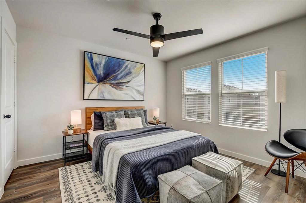 15101 Litsey Crk Drive, Unit 14925L Roanoke, TX 76262 - Photo 5 of 20 a bedroom with beds and a window