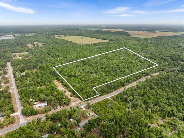 a view of a yard from a balcony