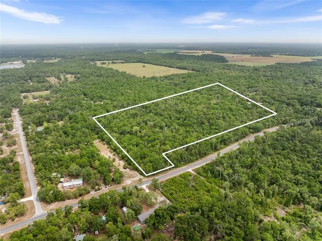 a view of a yard from a balcony