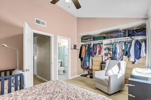a living room with lots of furniture and a flat screen tv