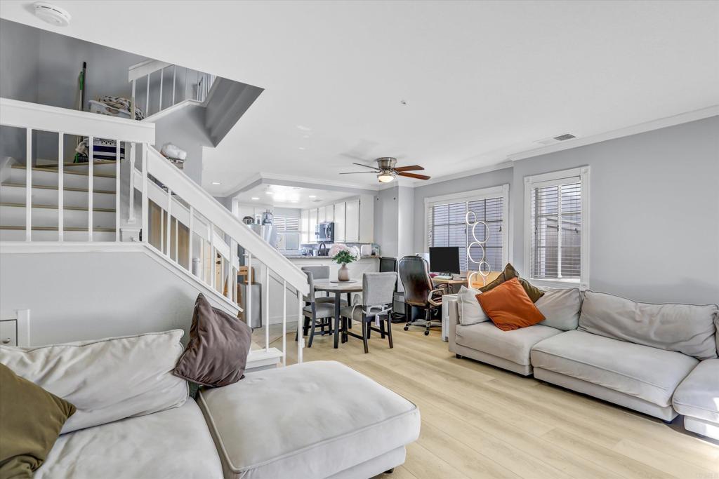 2102 Kings View Circle Spring Valley, CA 91977 - Photo 3 of 27 a living room with furniture and a large window