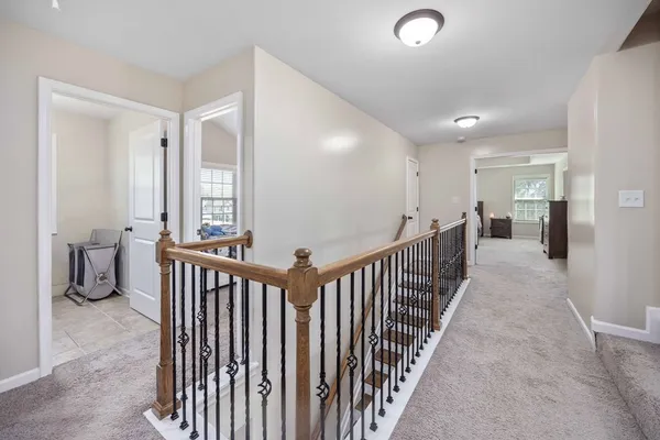 a view of entryway with wooden floor