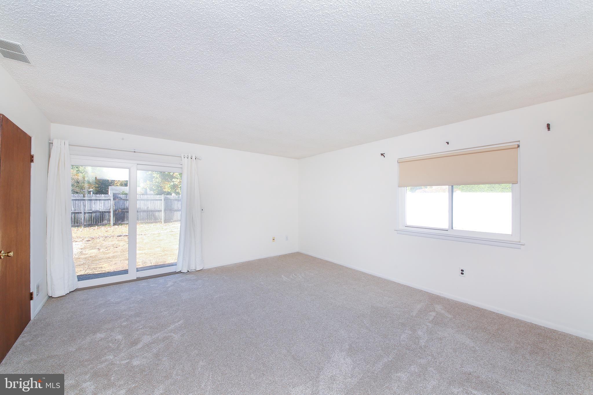 607 Cedar Grove Road Toms River, NJ 08753 - Photo 16 of 30 Main bedroom with sliding door to backyard