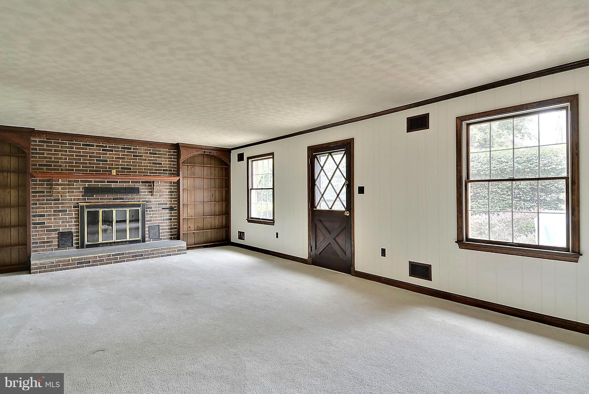 212 Indian Spring Drive Silver Spring, MD 20901 - Photo 8 of 22 an empty room with windows